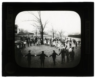 Horizontal, Black and White Photo of Boys and Girls Holding Hands and Forming Circles Outdoors by Unbekannt Unbekannt
